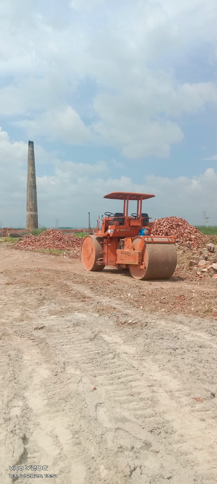 Land compaction with road roller