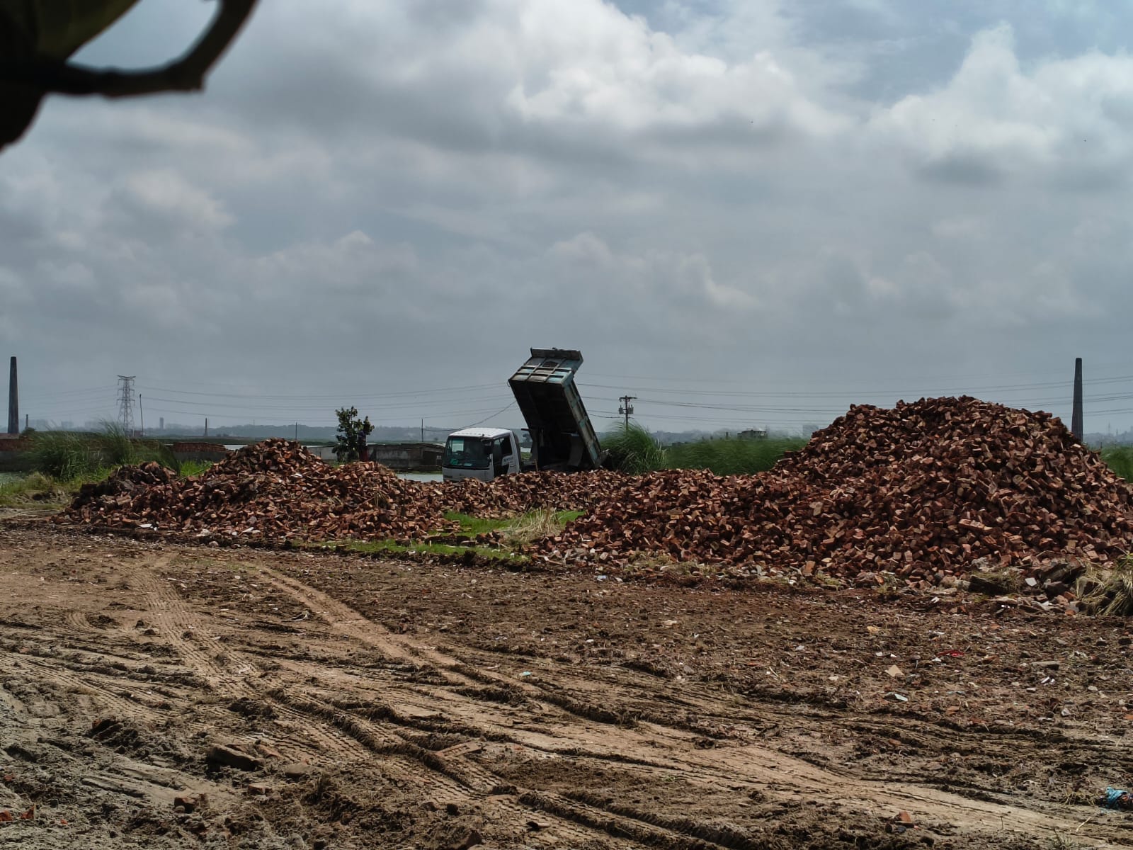 Site machinery on graded road
